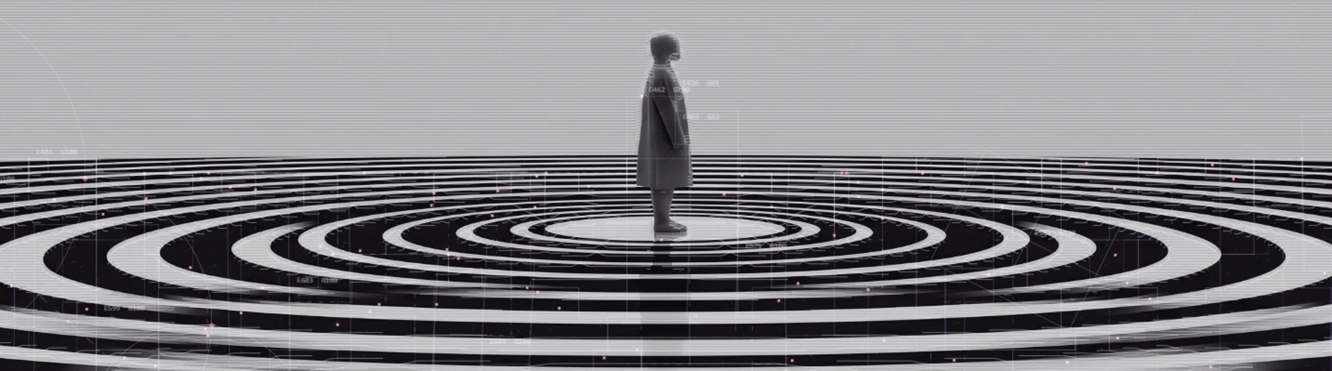 A lone figure standing at the center of black and white rings